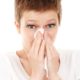 sneezing woman
