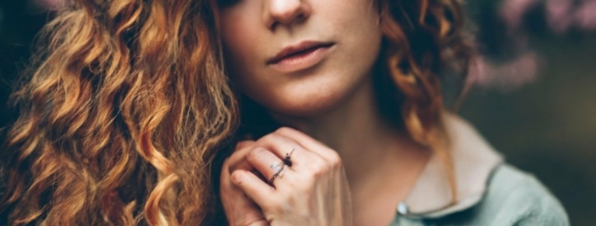 Woman reflecting with eyes closed